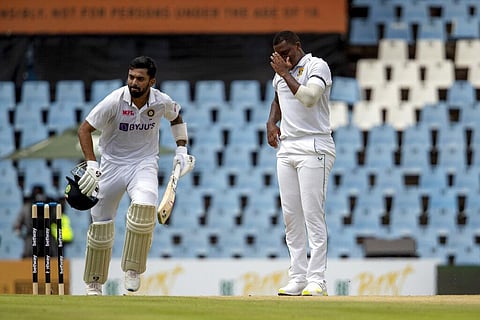 South Africa's Lungi Ngidi, right, reacts as India's KL Rahul runs between the wickets during the Test Cricket match between South Africa India at Centurion Park in Pretoria. (Photo | AP)