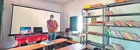Rameshwar Prasad at one of his computer training centres-cum-libraries. (Photo | EPS)
