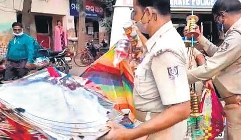 Mangalabag police seize banned kite strings and other items from a shop