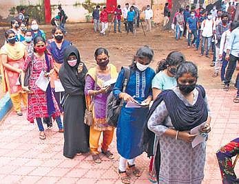 File photo of candidates queueing up in front of an examination hall