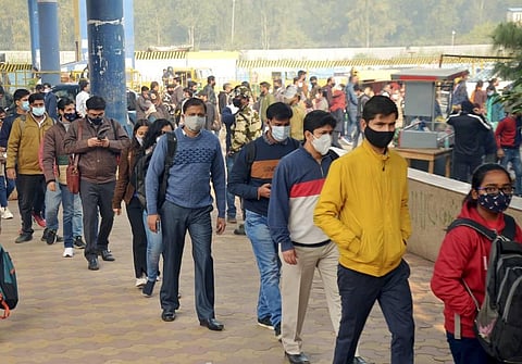 Crowd of passengers at the Arthla Metro Station after new travel guidelines were issued in the wake of of rise in COVID-19 cases, in Ghaziabad. (Photo | PTI)