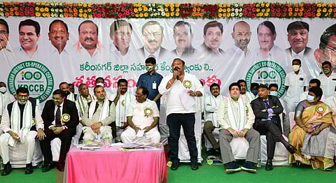 Civil Supplies Minister Gangula Kamalakar speaks at the centenary celebrations of the DCCB. Nabard Chairman Govinda Rajulu Chinthala can be seen in the picture (Photo | Twitter, GKamalakarTRS)