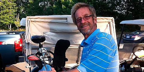 Tom Randele, whose real name according to authorities is Ted Conrad, tends to golf clubs. (Photo | AP)