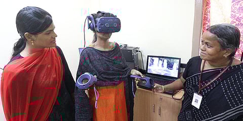 Team led by Associate Prof. D Tamilselvi tests a head-mount device used as a tool for rehabilitation in occupational therapy, physiotherapy and special education. (Photo| KK Sundar, EPS)