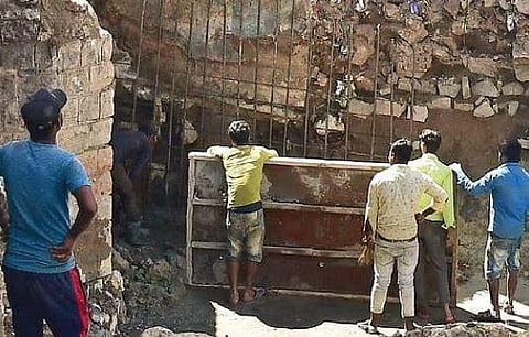 SWD work near Venkateshwara Temple in Halasuru exposed soil around the Metro pillar| Shriram BN