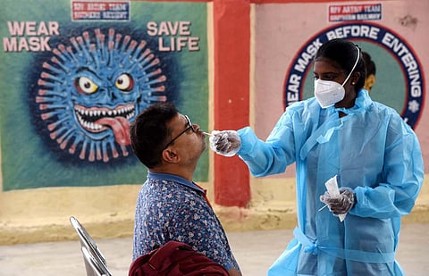 Passengers arriving from Karnataka undergo covid test at Chennai central railway station. (Photo | R Satish Babu, EPS)
