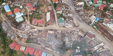 In this aerial photo released by the Chin Human Rights Organization, fires destroy numerous buildings in the town of Thantlang in Chin State in northwest Myanmar, on Dec. 4, 2021. (Photo | AP)