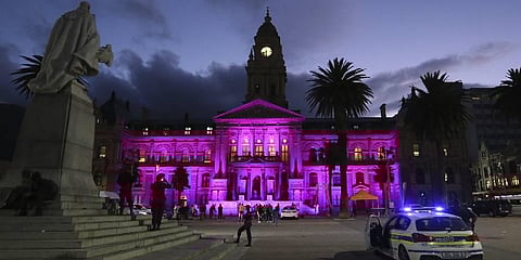 The City Hall is lit up in purple to honour Anglican Archbishop Emeritus Desmond Tutu in Cape Town, South Africa. (Photo | AP)