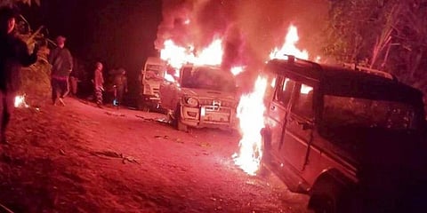 Angry villagers burn vehicles belonging to security personnel after 13 civilians were killed by the security forces in two incidents of firing at Oting village in Nagaland. (Photo | PTI)