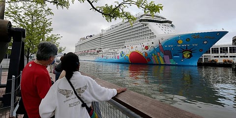 FILE - People pause to look at Norwegian Cruise Line's ship, Norwegian Breakaway, on the Hudson River, in New York, on May 8, 2013. (Photo | AP)