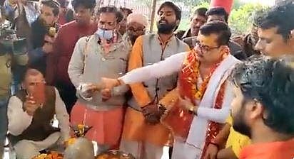 Rizvi offering milk on the Shiva Linga at Dasna Devi temple in Ghaziabad as part of the ritual. (Photo | Twitter)