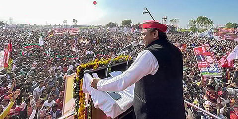 Samajwadi Party President Akhilesh Yadav waves at the crowd during 'Parivartan Sandesh' rally ahead of the UP Assembly elections 2022, in Meerut, Tuesday, Dec. 7, 2021. (Photo | PTI)