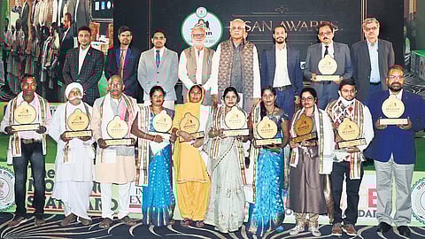 Chhattisgarh CM Bhupesh Bahghel (fourth from right), The New Indian Express Group editorial director Prabhu Chawla (fourth from left) with the award winners in Raipur on Monday. (Photo | EPS)