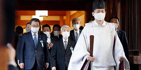 Japanese lawmakers visit the Yasukuni Shrine in Tokyo Tuesday, Dec. 7, 2021, the eve of Japan’s Pearl Harbor attack 80 years ago. (Photo | AP)