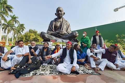 Samajwadi Party President Akhilesh Yadav joins the protest to support the suspended Rajya Sabha MPs. (Photo | PTI)