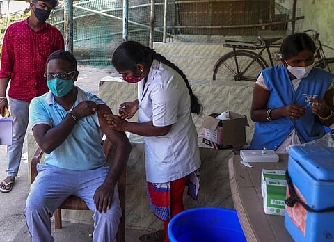 A health worker administers COVID-19 vaccine in Hyderabad, India, Wednesday, Dec. 8, 2021. (Photo | AP)