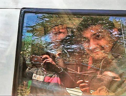 Mandeep Punia being taken away by police | Twitter