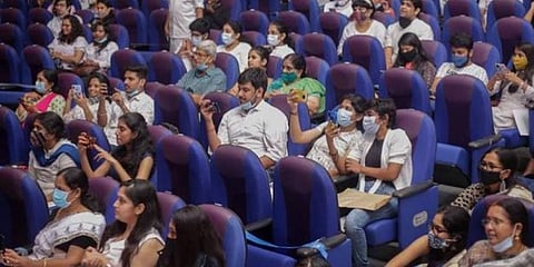 Audience seated with masks under 50 per cent occupancy in Motta Maadi Music's recent concert in Chennai. (Photo | Motta Maadi Music Instagram)