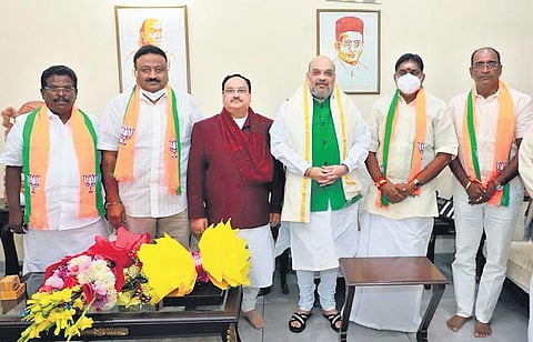 Former Puducherry Minister A Namassivayam and former MLA Theepainthan with BJP president JP Nadda and Union Home Minister Amit Shah in Delhi.