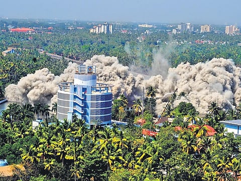 Holy Faith H2O at Maradu collapsing during the controlled implosion | File pic
