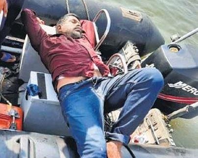 Man lying unconscious on the safety boat