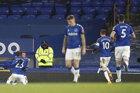 Everton's Bernard, second left, celebrates after scoring his side's fifth goal during the English FA Cup 5th round match against Tottenham Hotspur at Goodison Park, Liverpool. `(Photo | AP)