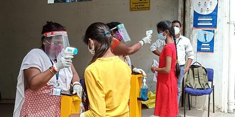 Students being thermal screened before attending EAMCET exam in Telangana last year (Photo | Vinay Madapu, EPS)
