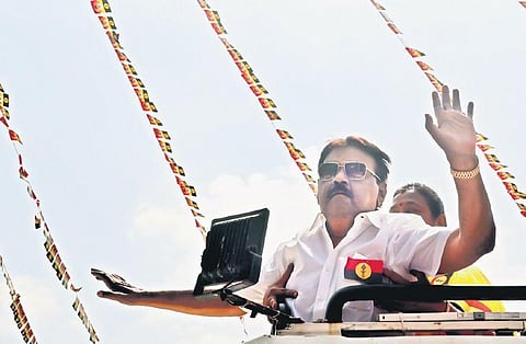 DMDK chief Vijayakant waving to supporters at party headquarters in Chennai on Friday | Sri Loganathan V