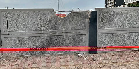 A wall is damaged in a residential complex after rockets attack in Irbil, Iraq. (Photo| AP)
