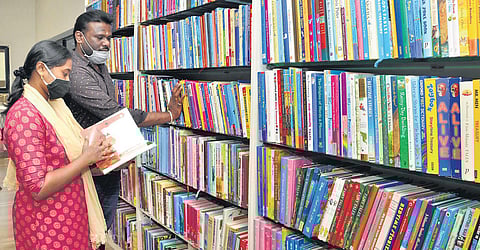 Readers browsing books at Omni Books Library, in Coimbatore on Tuesday | Express