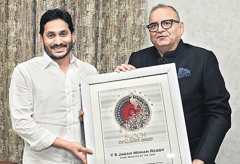 CM Jagan Mohan Reddy receives the SKOCH Chief Minister of the Year Award from SKOCH Group Chairman Sameer Kochhar at Tadepalli on Tuesday | Express