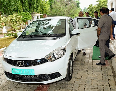 CM Nitish Kumar steps into his electric car. (File Photo | Express)