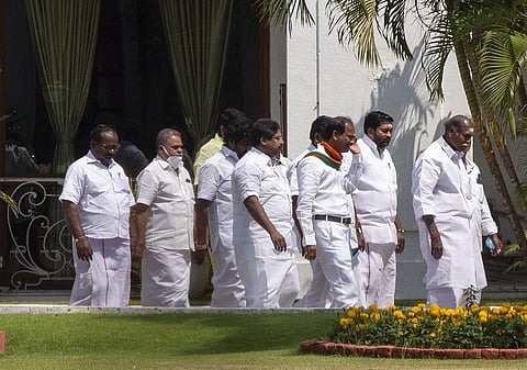 MLAs led by N Rangasamy on Raj Nivas premises in Puducherry. (Photo | G Pattabi Raman, EPS)
