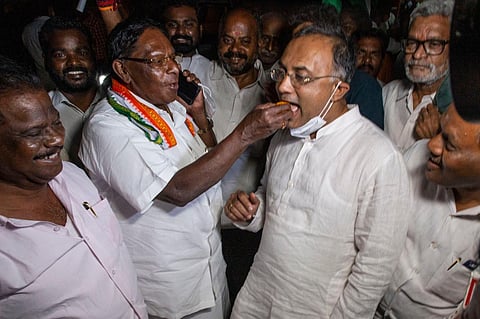 Puducherry Chief Minister V Narayansamy with party cadres and leaders celebrating the removal of  Lt Governor Kiran Bedi on Tuesday at the party office. (Photo | G Pattabi Raman, EPS)