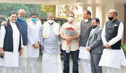 Former CM Siddaramaiah and others pose with  Congress leader Rahul Gandhi in New Delhi on Tuesday 