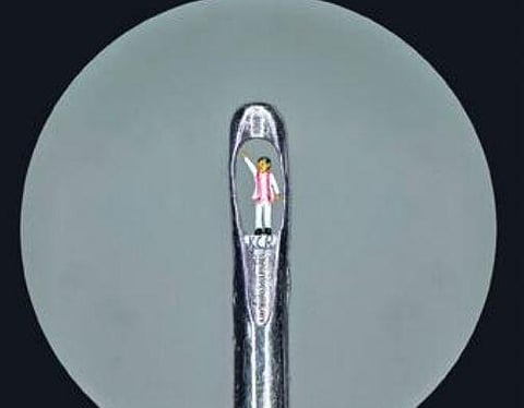 A miniature sculpture of Chief Minister K Chandrasekhar Rao created by micro sculptor Ajay Kumar Mattewada of Warangal, to mark KCR’s 67th birthday