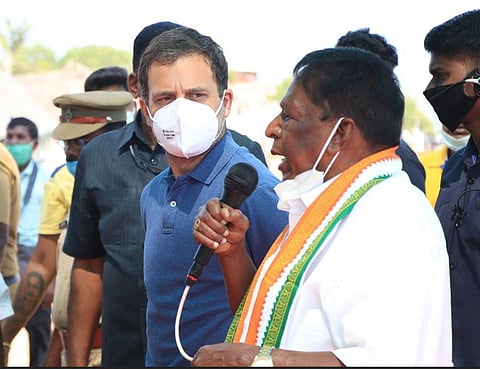 Congress leader Rahul Gandhi and Pondicherry chief minister V Narayanasamy interact with fishing community in Puducherry. (Photo | Express)
