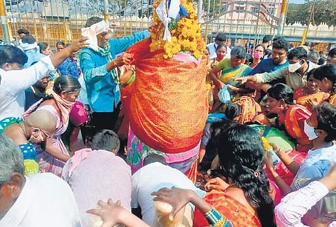 Tribal priests and devotees participate in the Manda Melige ritual.