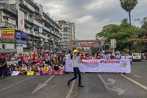 Demonstrators gather to protest against the military coup in Yangon, Myanmar. (Photo | AP)