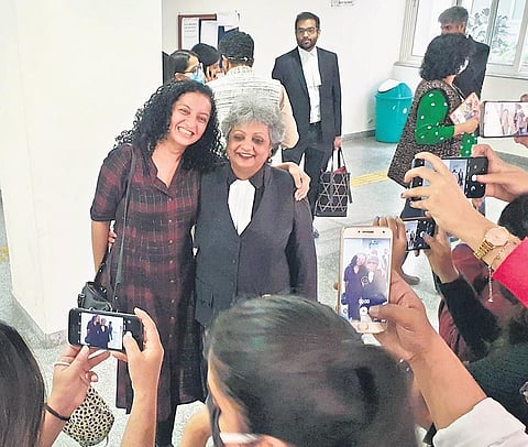 Priya Ramani and her lawyer Rebecca John after the court’s verdict. (Photo | Twitter)