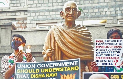 Congress members protest on Race Course Road showing their support for Disha Ravi, who was recently arrested in Bengaluru, on Wednesday | Shriram BN