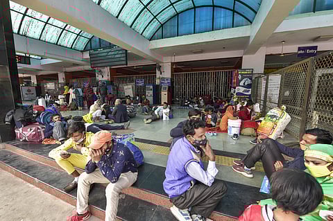 Passengers stranded at Anand Vihar Railway Station due to 'rail roko' demonstration called by Samyukta Kisan Morcha as part of their agitation against farm reform laws on Thursday. (Photo | PTI)