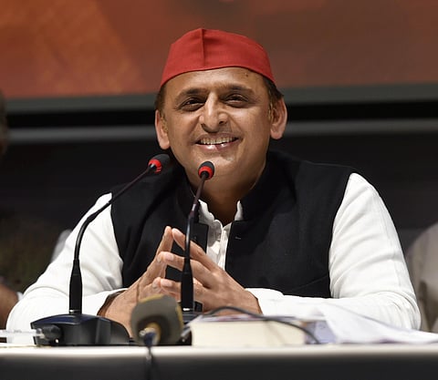Samajwadi Party President Akhilesh Yadav addresses a press conferance at party office in Lucknow, Friday. (Photo | PTI)