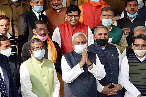 Bihar CM Nitish Kumar along with legislators arrives at Bihar Assembly, during the first day of Budget Session, in Patna. (Photo | PTI)