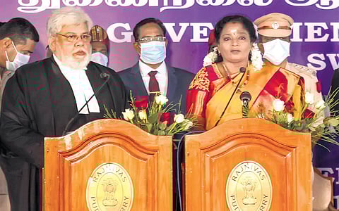 CJ of Madras HC, Sanjib Banerjee, administering the oath of office to Tamilisai Soundararajan at the swearing-in ceremony on Thursday | G pattabi raman