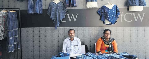 Artisan Lakshmi Lal Chhipa with garments in his Akola block prints. (Photo| EPS)