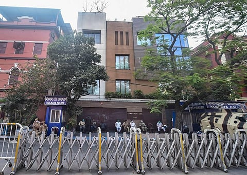 Police personnel deployed outside TMC MP Abhisekh Banerjee's residence after a CBI team reached his house in connection with an investigation into an alleged coal smuggling case. (Photo | PTI)