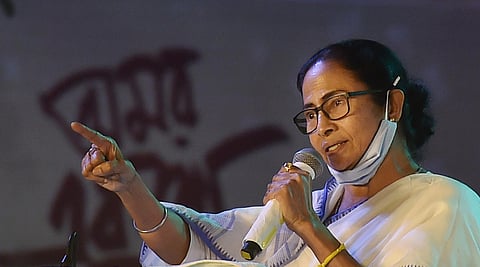 Mamata Banerjee addresses an event to mark International Mother Language Day, in Kolkata. (Photo | PTI)