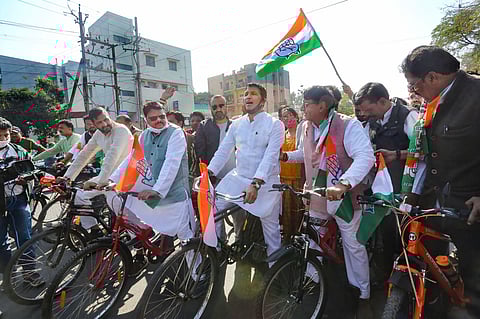 Congress MLAs ride bicycles as they stage a protest against the hike in fuel price. (Photo| PTI)