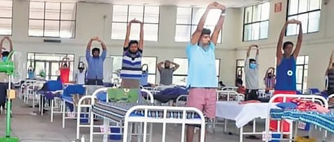 Representative image of patients performing yoga at a  Covid Care Centre